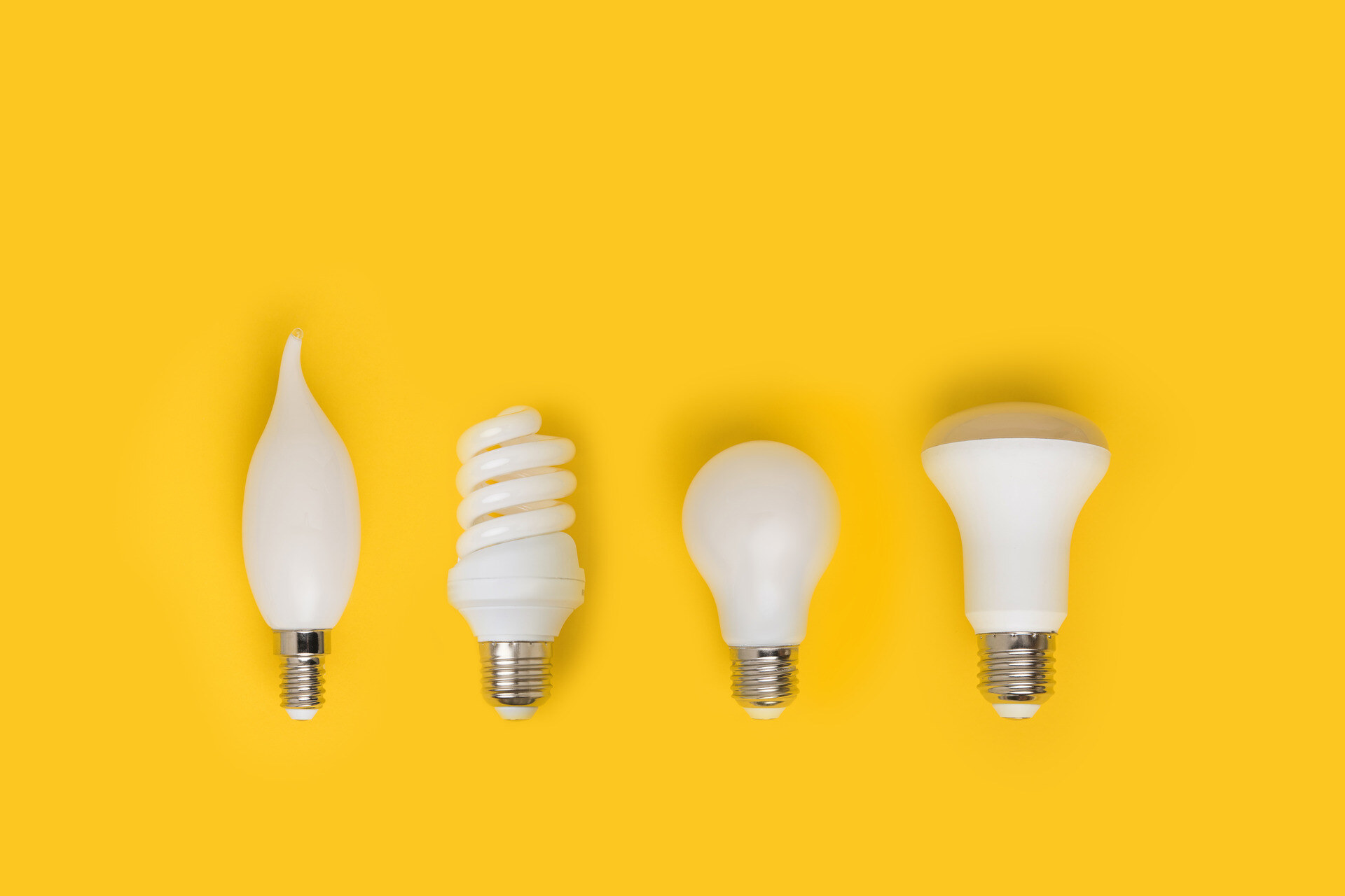top view of set of different white lamps isolated